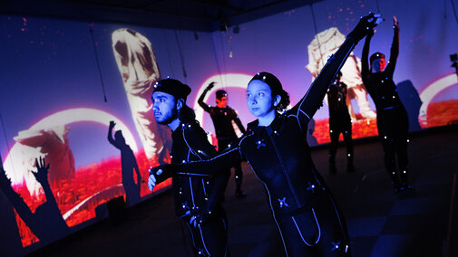 Students in Carson School wear motion capture suits