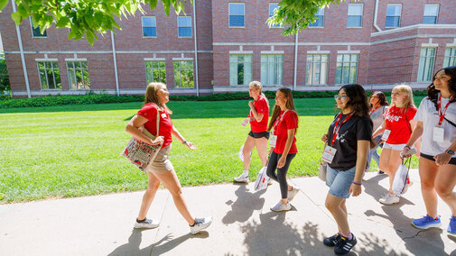 Students walking on campus for New Student Enrollment