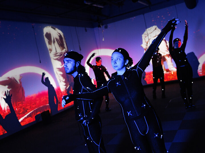 Students in Carson School wear motion capture suits